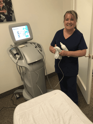 Our treatment room with our owner, Jane!