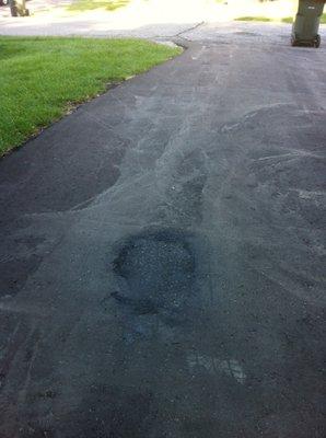 This is the "repair" to our driveway. Looks like a patch now.