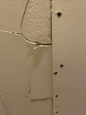 Cracking ceiling toilet will crash through