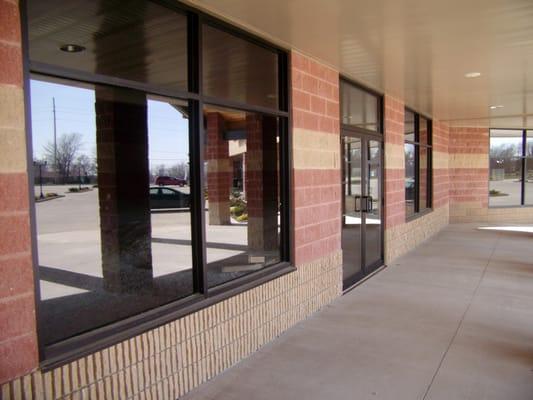 Storefront aluminum doors and windows. Entire plaza. Wadsworth Commons