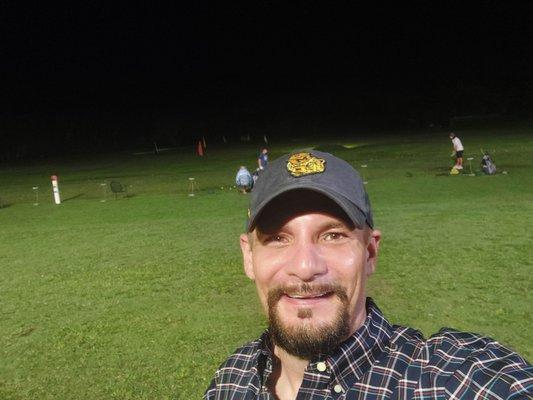 Nighttime driving range...and pretty diverse, casual crowd working on their individual shots. Pretty cool!