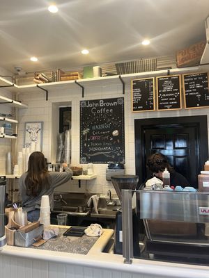 Baristas making the sauce