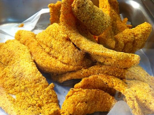 Hand breaded fish. The cornmeal mix the fish is breaded in is, really something unique.