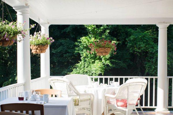 Our back deck sitting and dining area offers guests a relaxing spot to enjoy breakfast or our wine & cheese reception on warm Summer nights.