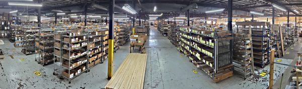 Overview of our warehouse with thousands of different door and window parts.