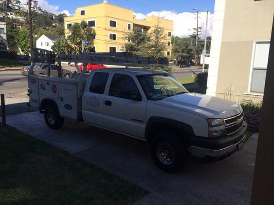 Blocking the driveway rather than parking on the street or the space fir the actual unit he is working on.