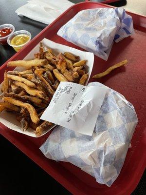 These are the medium fries that come with a combo. 2 of us couldn't finish them all. And 2 single cheeseburgers.