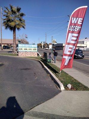 Sign and "we accept EBT" banner