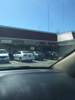 Shop in the corner near Dollar Tree