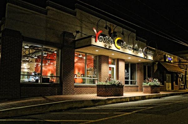 The Yadkin Cultural Arts Center entrance at night.