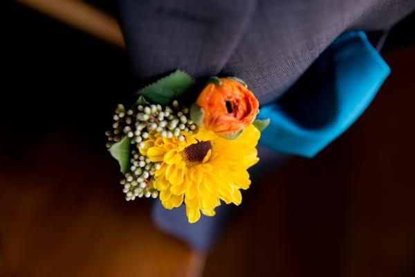 Boutonnieres for the groom, groomsmen, and dads.