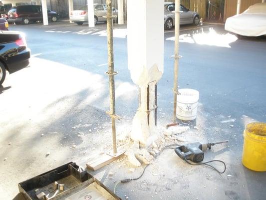 This column was struck and fractured compromising the support. Repaired with structural concrete product.