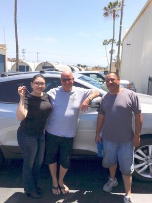 Bob Mangione (owner) and Vehicle detailing specialist Alejandro (far right )