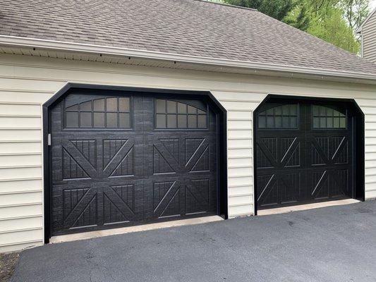 Cambridge 300 doors in black with obscure windows and black metal trim around door openings.