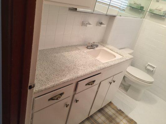 Countertop, Sink, Floor, and Walls Refinished