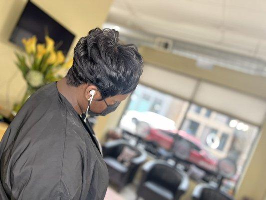 black hair relaxer with custom pixie cut with oloplex moisture treatment.