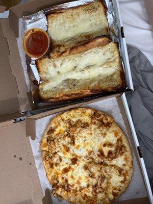 Small buffalo pizza and cheese garlic bread.