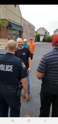 Vince laughing at protesters.