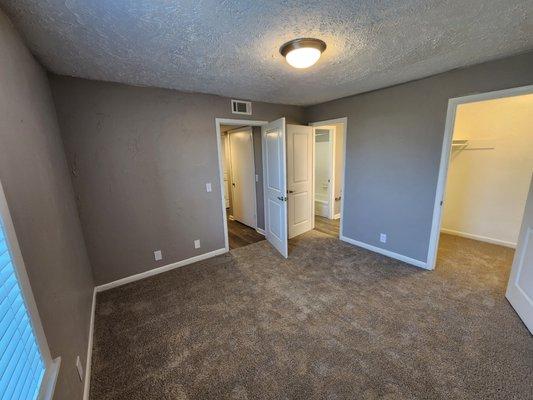 Master bedroom with spacious walk in closet and bath