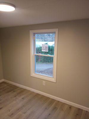 Replacement windows and a repaint interior walls,  ceiling in a home.