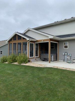 3 Seasons and covered hot tub area with retractable screens