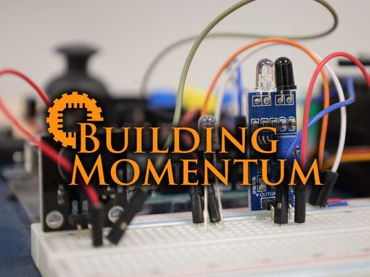 Breadboard circuit for prototyping. Logo overlay.