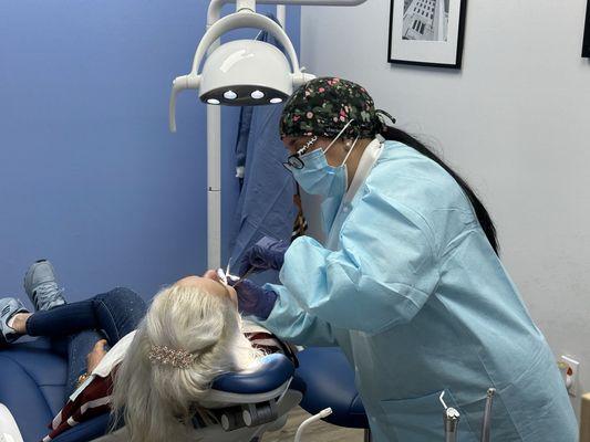 A patient having a scheduled check-up in save on dentistry