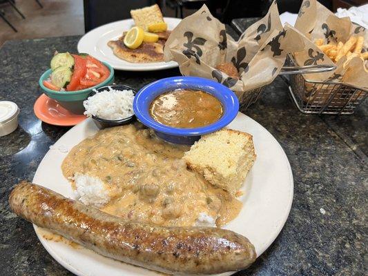 Trio, Blackened Catfish, fries, salad and boudin balls