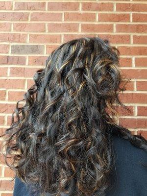 Natural curls styled with a curl enhancer product and added some baby lights.