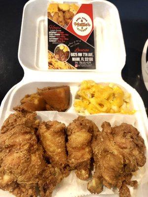 Chicken dinner with rice and 2 sides (mac n cheese and yams)