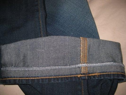 Finished "original" hem (inside). AG lightweight denim.