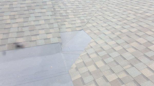 Elmco replaces flat roofing on sun rooms, screen room, and back patios.