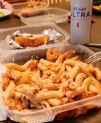 6/23/2024 Ultimate Cajun pasta adds the shrimp and chicken garlic toast. And bottle of Michelob ultra at home