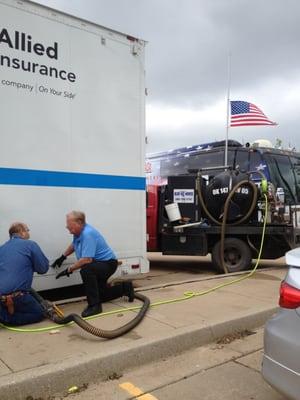 Pumping holding tanks during the Moore tornado disaster.