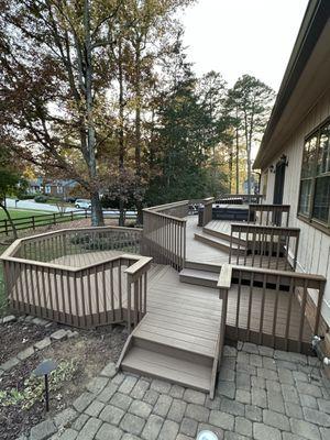 Repaired, pressure washed, and stained deck