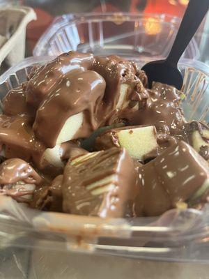 Caramel apple with pecans drizzled in chocolate if your choosing ( milk chocolate)