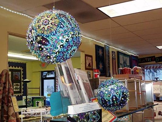 Cool ornament made with fabric, sequins and beads.