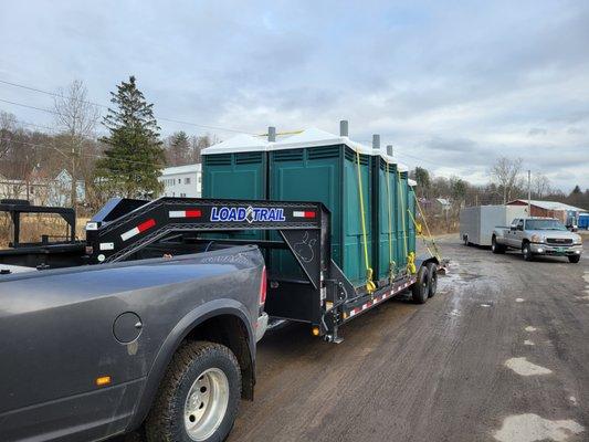 We helped a local business with shipping his Porta toilets! 
We even squeezed some in the enclosed trailer in the background!