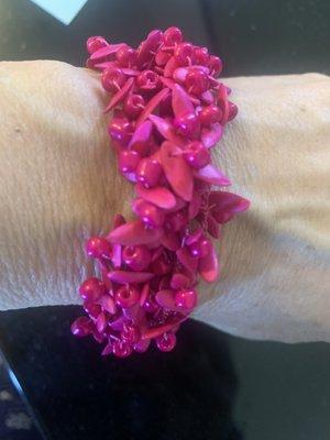 Pretty in pink... bracelet made from cantaloupe seeds.