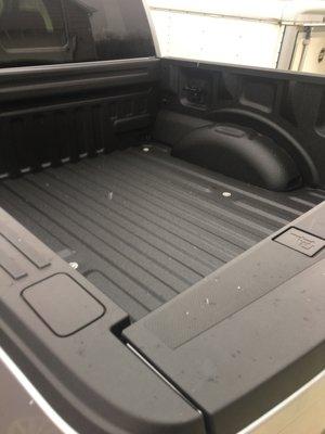 Spray on truck bed liner