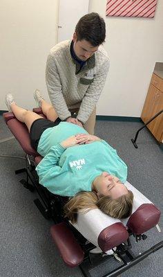 Gentle and specific adjustment performed on a pregnant mama to help ease pregnancy pains.