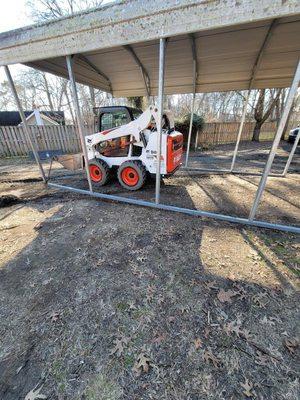 Here we are moving a carport for our customer