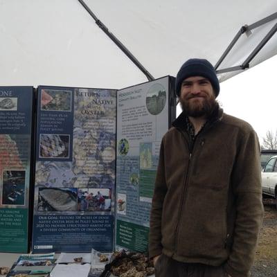 Puget Sound Restoration Fund booth with Derek King (photo taken with permission. Thank you Mr. King!