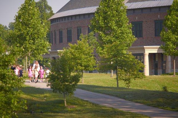 40 acre campus with native woods, creek, athletic fields, 3 playgrounds, walking paths and school garden makes this backyard one of its kind