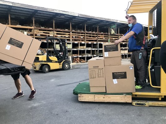 The guys loading the cupboards