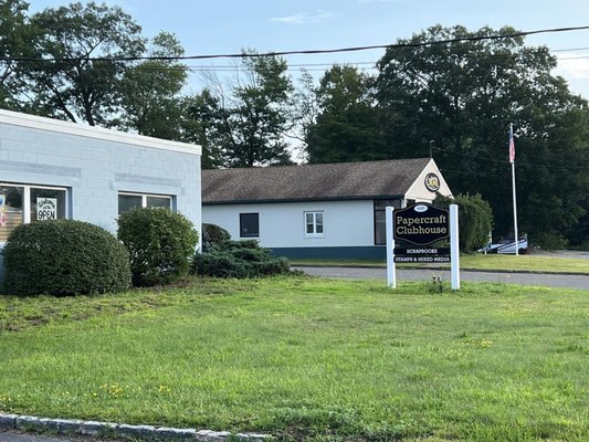 We recently repainted the building in a light blue color with white trim.