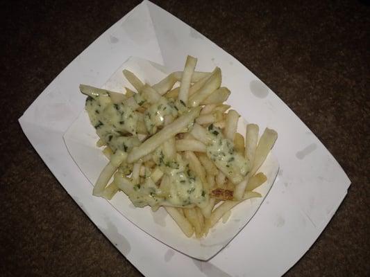 This is the most NAUSEATING thing ever the parmesan cheese crap they put on the frozen fries Vomit on fries