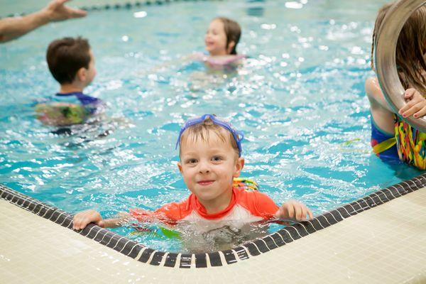 Children enjoying their swim class