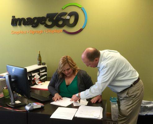 Working with our client at Image 360 Eau Claire.