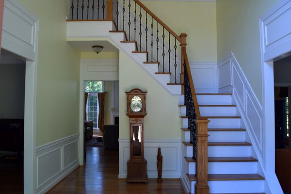 Stairs after, Hard wood no squeaks, iron balusters and bulkier posts.